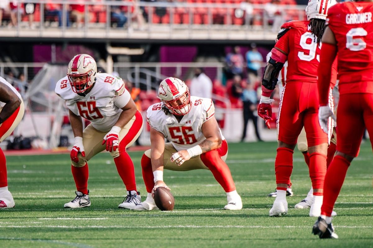 Mar 30, 2025; Washington, D.C., USA; Birmingham Stallions guard Cole Schneider (56) prepares before the play in the fourth quarter against the DC Defenders at Audi Field. Mandatory Credit: Emily Faith Morgan-Imagn Images