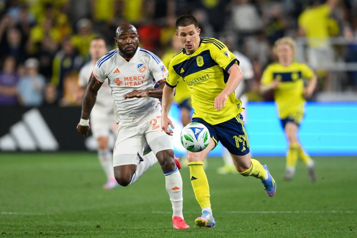 Mar 29, 2025; Nashville, Tennessee, USA;  Nashville SC midfielder Alex Muyl (19) dribbles the ball against the FC Cincinnati during the second half at Geodis Park. Mandatory Credit: Steve Roberts-Imagn Images