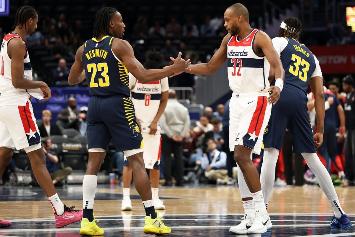 Mar 27, 2025; Washington, District of Columbia, USA; Washington Wizards forward Khris Middleton (32) and Indiana Pacers forward Aaron Nesmith (23) greet each other before a game at Capital One Arena. Mandatory Credit: Daniel Kucin Jr.-Imagn Images