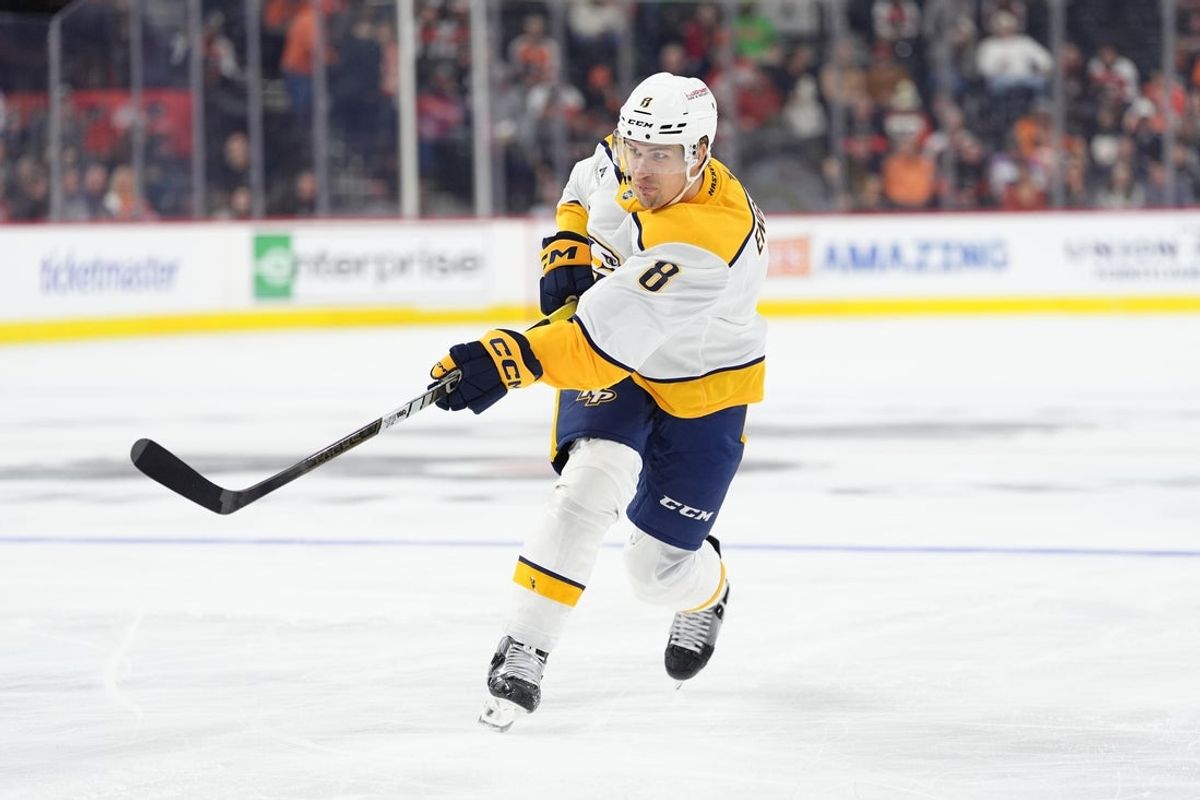 Mar 31, 2025; Philadelphia, Pennsylvania, USA; Nashville Predators defenseman Andreas Englund (8) shoots the puck against the Philadelphia Flyers in the first period at Wells Fargo Center. Mandatory Credit: Kyle Ross-Imagn Images