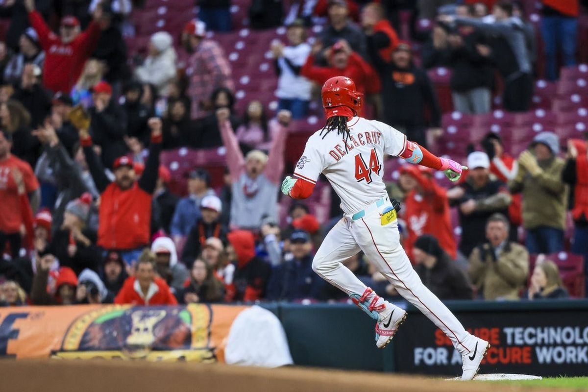 Mar 31, 2025; Cincinnati, Ohio, USA; Cincinnati Reds shortstop Elly De La Cruz (44) runs the bases after hitting a three-run home run in the second inning against the Texas Rangers at Great American Ball Park. Mandatory Credit: Katie Stratman-Imagn Images