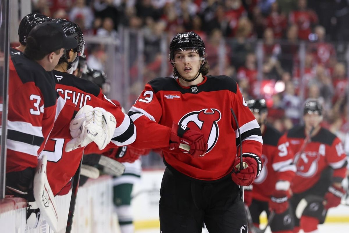 Mar 31, 2025; Newark, New Jersey, USA; New Jersey Devils defenseman Luke Hughes (43) celebrates his goal against the Minnesota Wild during the first period at Prudential Center. Mandatory Credit: Ed Mulholland-Imagn Images