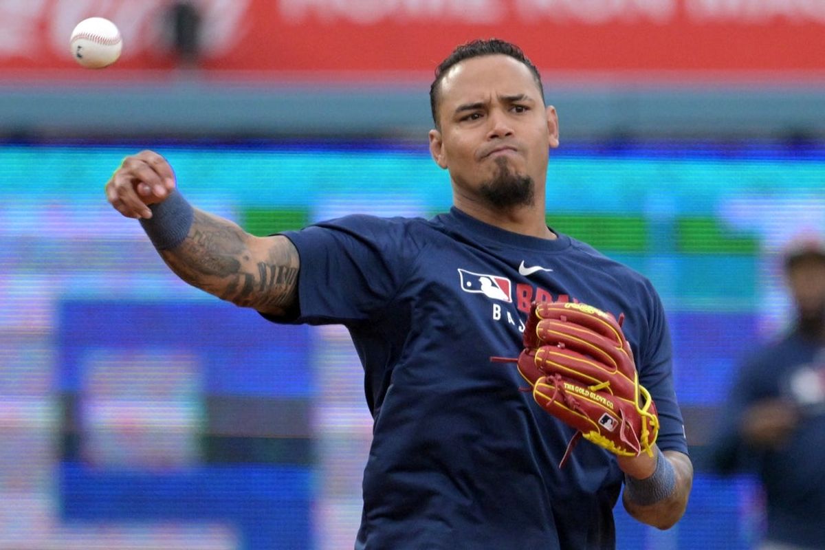 Mar 31, 2025; Los Angeles, California, USA;  Atlanta Braves shortstop Orlando Arcia (11) warms up prior to the game against the Los Angeles Dodgers at Dodger Stadium. Mandatory Credit: Jayne Kamin-Oncea-Imagn Images