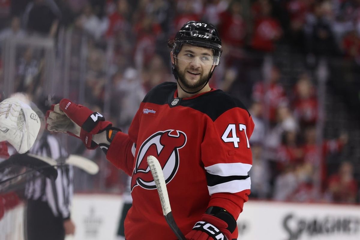 Mar 31, 2025; Newark, New Jersey, USA; New Jersey Devils center Paul Cotter (47) celebrates his goal against the Minnesota Wild during the overtime shootout at Prudential Center. Mandatory Credit: Ed Mulholland-Imagn Images