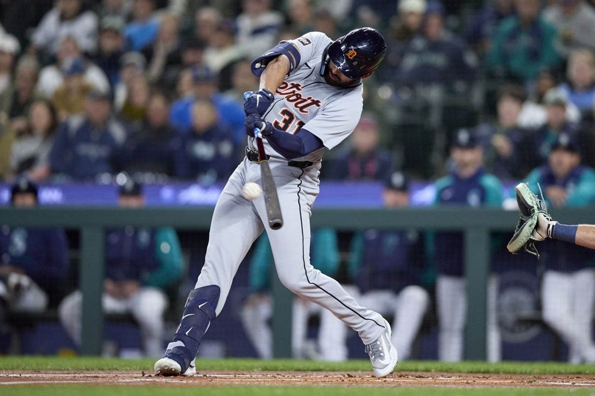 Mar 31, 2025; Seattle, Washington, USA; Detroit Tigers center fielder Riley Greene (31) hits a home run against the Detroit Tigers during the first inning at T-Mobile Park. Mandatory Credit: John Froschauer-Imagn Images