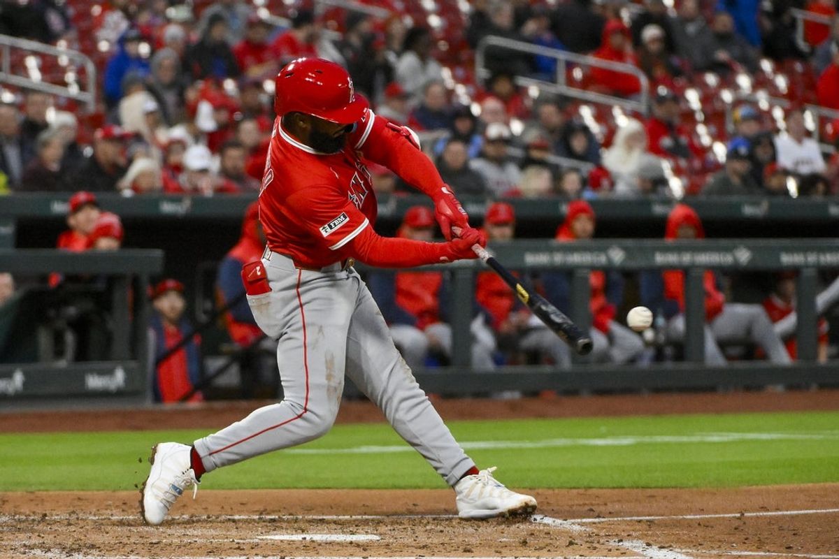 Apr 1, 2025; St. Louis, Missouri, USA;  Los Angeles Angels second baseman Luis Rengifo (2) hits a one run double against the St. Louis Cardinals during the third inning at Busch Stadium. Mandatory Credit: Jeff Curry-Imagn Images