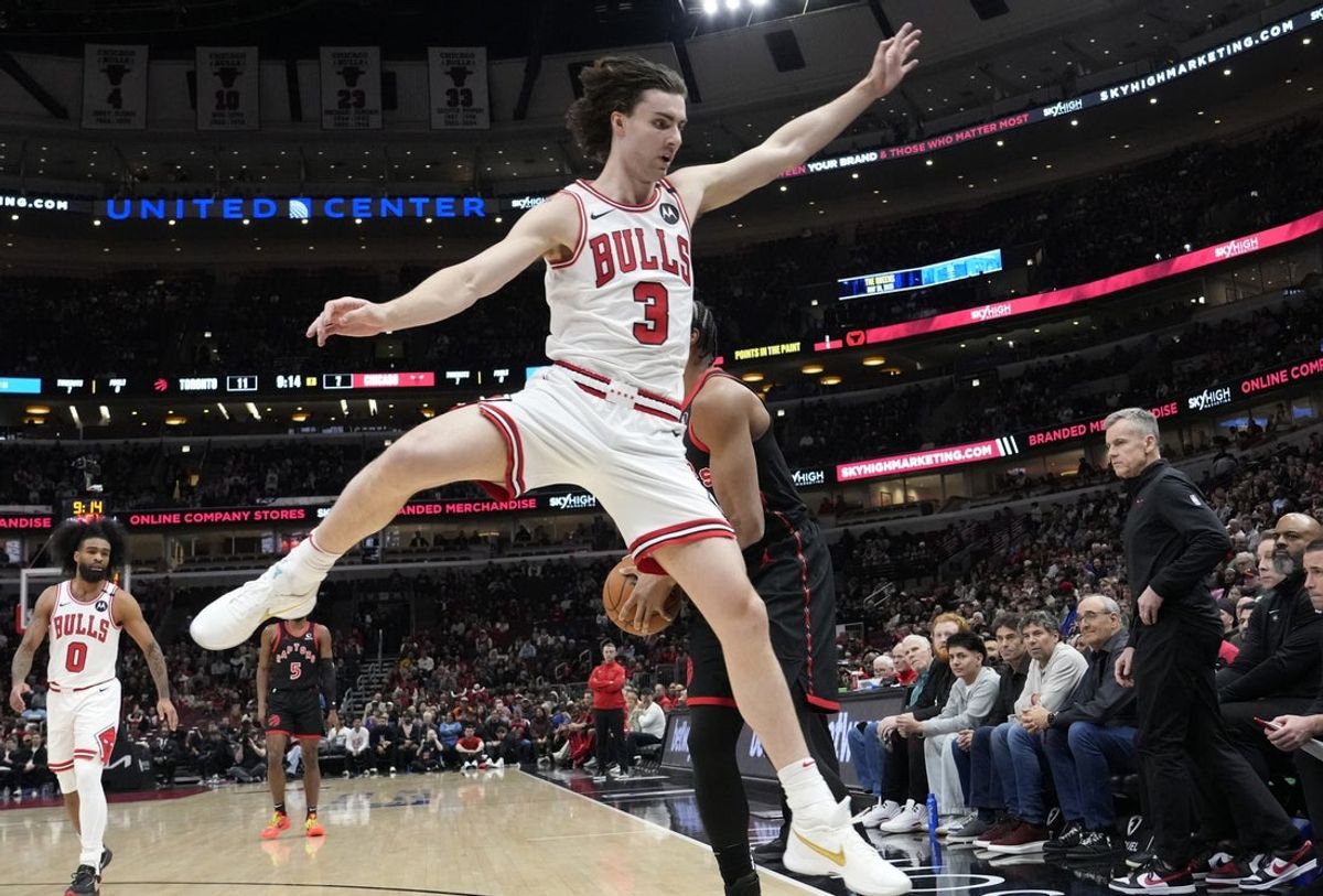 Apr 1, 2025; Chicago, Illinois, USA; Chicago Bulls guard Josh Giddey (3) defends Toronto Raptors forward Scottie Barnes (4) during the first quarter at United Center. Mandatory Credit: David Banks-Imagn Images