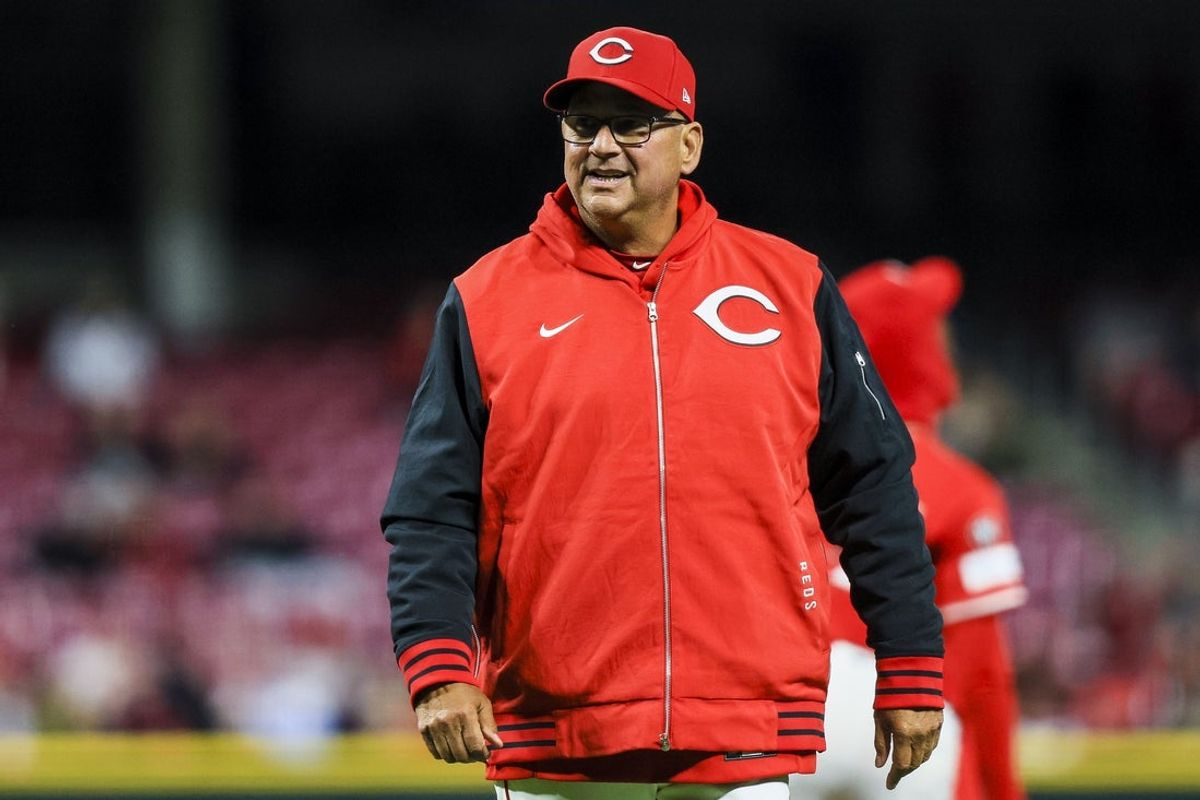 Apr 1, 2025; Cincinnati, Ohio, USA; Cincinnati Reds manager Terry Francona (77) walks off the field during a pitching change in the eighth inning against the Texas Rangers at Great American Ball Park. Mandatory Credit: Katie Stratman-Imagn Images