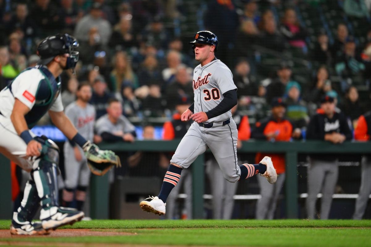 Apr 1, 2025; Seattle, Washington, USA; Detroit Tigers left fielder Kerry Carpenter (30) scores a run against the Seattle Mariners during the first inning at T-Mobile Park. Mandatory Credit: Steven Bisig-Imagn Images