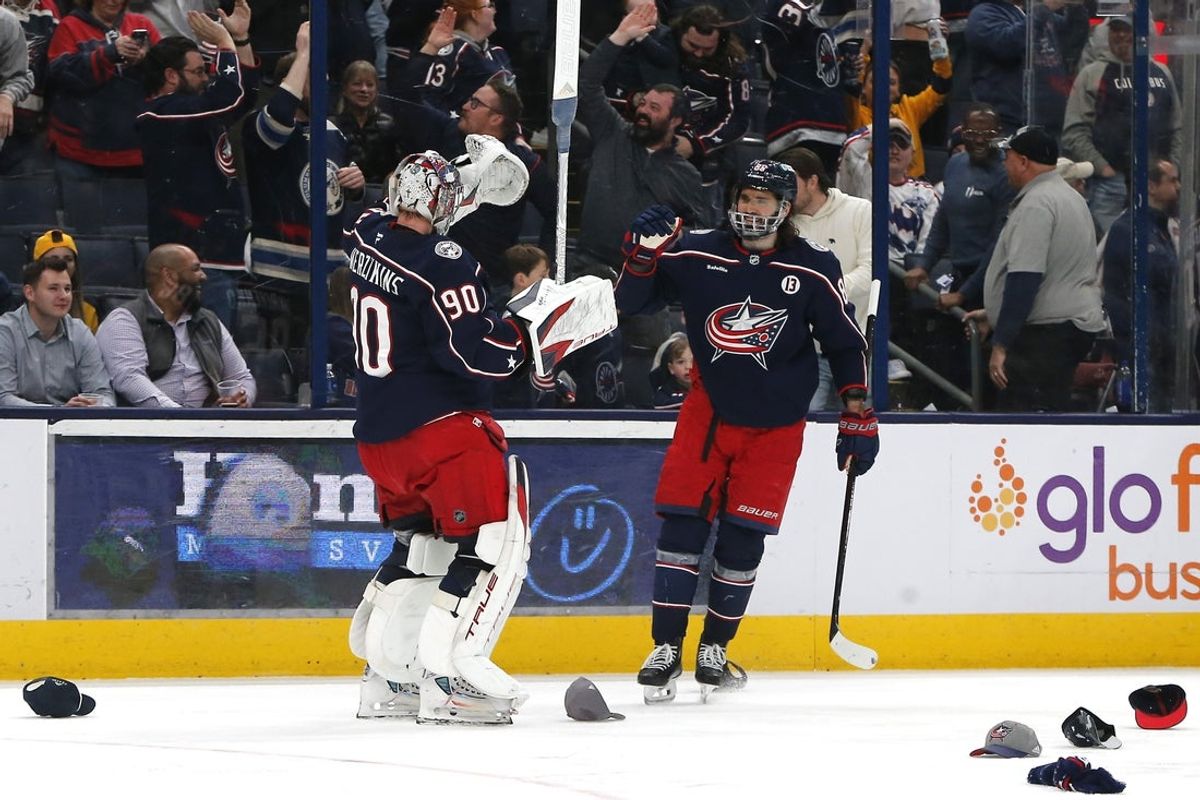 Apr 1, 2025; Columbus, Ohio, USA; Columbus Blue Jackets right wing Kirill Marchenko (86) celebrates his hat trick goal against the Nashville Predators during the third period at Nationwide Arena. Mandatory Credit: Russell LaBounty-Imagn Images