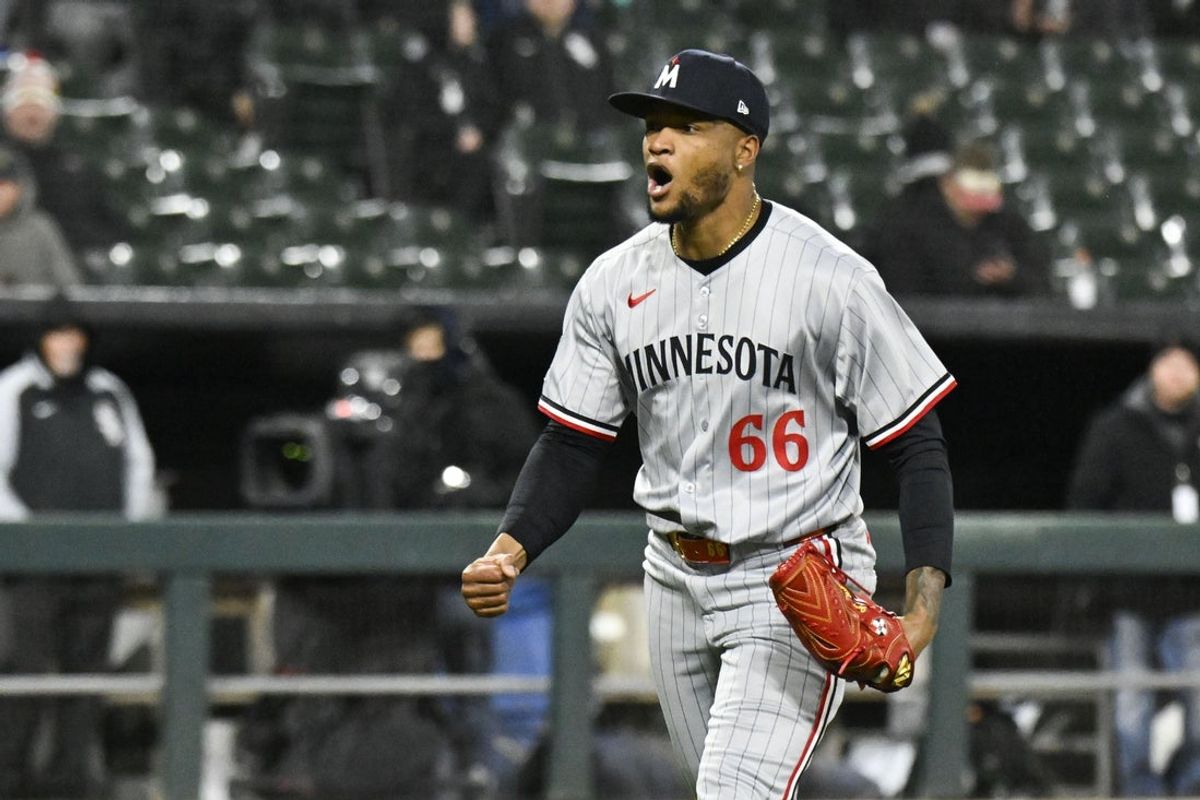 Apr 1, 2025; Chicago, Illinois, USA;  Minnesota Twins pitcher Jorge Alcala (66) reacts after closing out the seventh inning against the Chicago White Sox at Guaranteed Rate Field. Mandatory Credit: Matt Marton-Imagn Images