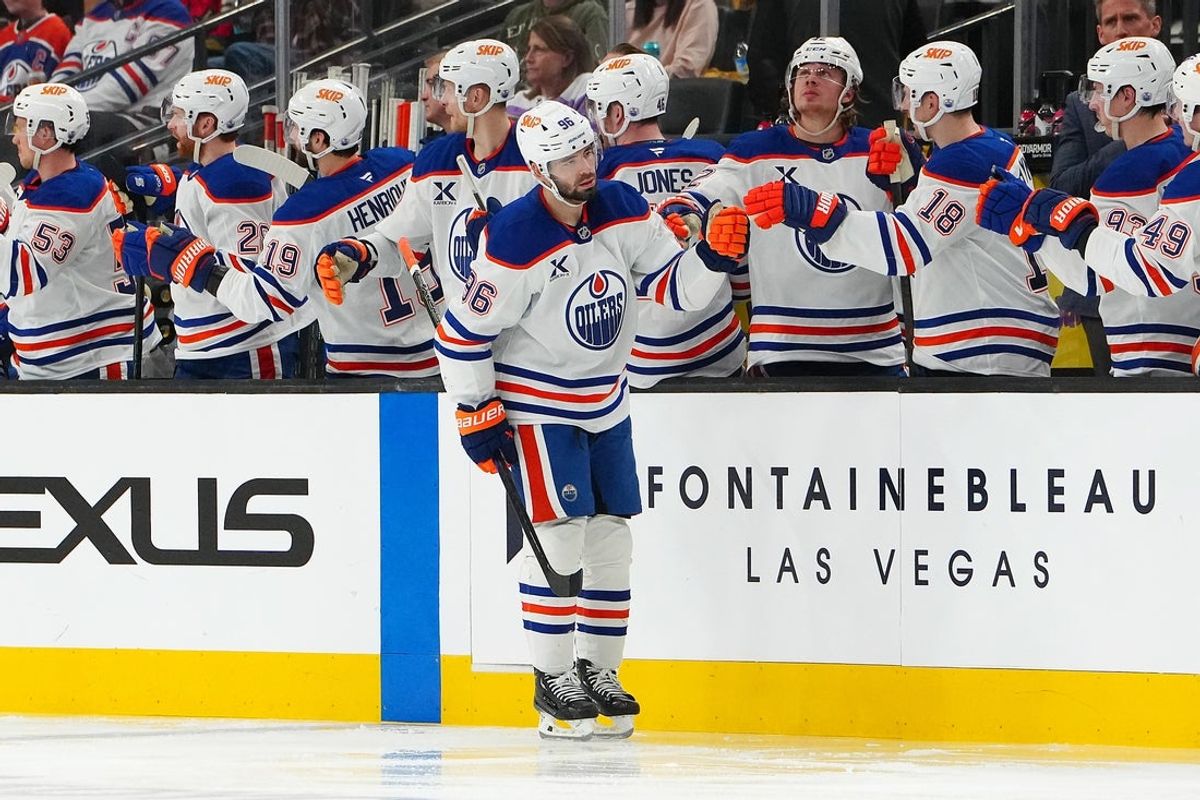 Apr 1, 2025; Las Vegas, Nevada, USA; Edmonton Oilers defenseman Jake Walman (96) celebrates after scoring a goal against the Vegas Golden Knights during the second period at T-Mobile Arena. Mandatory Credit: Stephen R. Sylvanie-Imagn Images