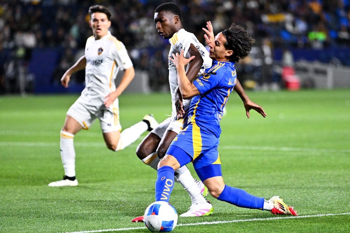Apr 1, 2025; Carson, California, USA; Tigres UANL midfielder Diego Lainez (16) and LA Galaxy defender Carlos Garcés (25) battle for the ball during the first half at Dignity Health Sports Park. Mandatory Credit: Kelvin Kuo-Imagn Images