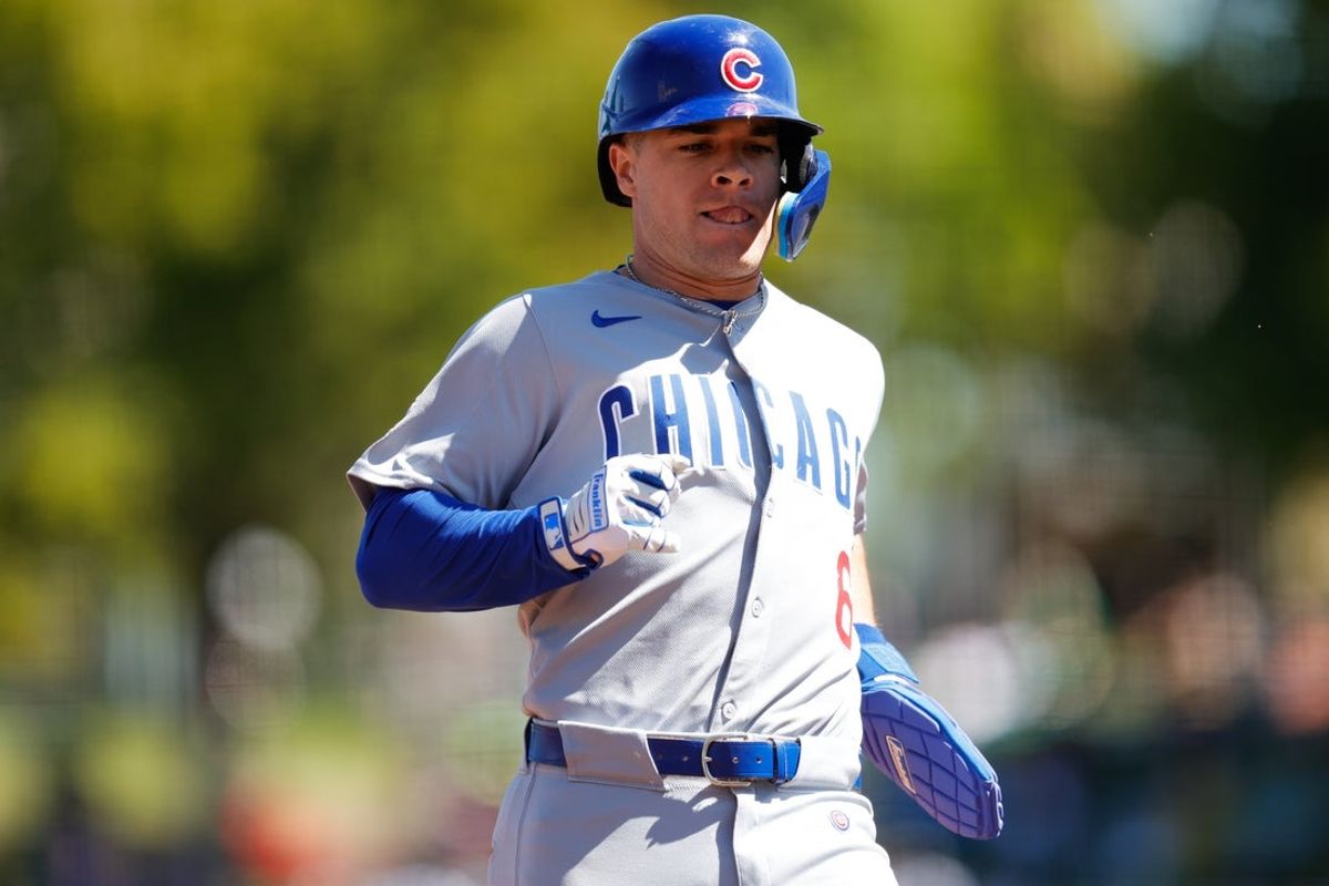 Apr 2, 2025; West Sacramento, California, USA; Chicago Cubs second base Matt Shaw (6) advances to third base on a single by outfielder Ian Happ (8) during the second inning against the Athletics at Sutter Health Park. Mandatory Credit: Sergio Estrada-Imagn Images