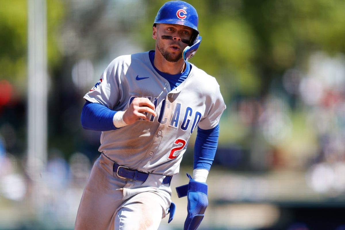 Apr 2, 2025; West Sacramento, California, USA; Chicago Cubs second base Nico Hoerner (2) scores a run on a single by outfielder Pete Crow-Armstrong (4) during the fourth inning against the Athletics at Sutter Health Park. Mandatory Credit: Sergio Estrada-Imagn Images
