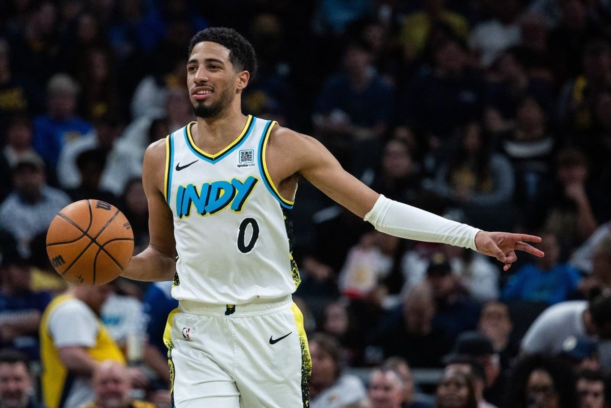 Apr 2, 2025; Indianapolis, Indiana, USA; Indiana Pacers guard Tyrese Haliburton (0) dribbles the ball in the second half against the Charlotte Hornets at Gainbridge Fieldhouse. Mandatory Credit: Trevor Ruszkowski-Imagn Images