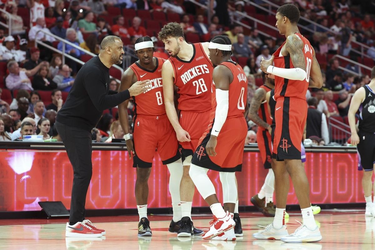 Apr 2, 2025; Houston, Texas, USA; Houston Rockets head coach Ime Udoka talks with players during the fourth quarter against the Utah Jazz at Toyota Center. Mandatory Credit: Troy Taormina-Imagn Images