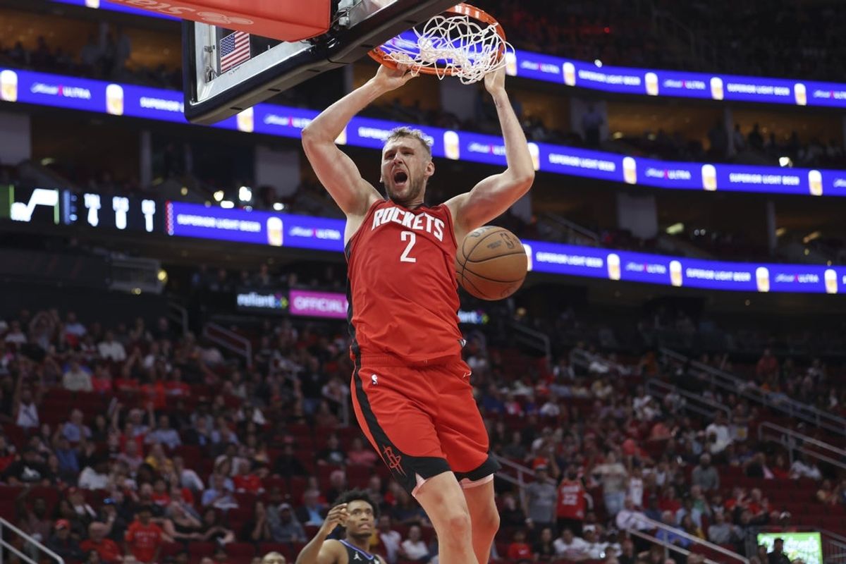 Apr 2, 2025; Houston, Texas, USA; Houston Rockets center Jock Landale (2) dunks the ball during the fourth quarter against the Utah Jazz at Toyota Center. Mandatory Credit: Troy Taormina-Imagn Images