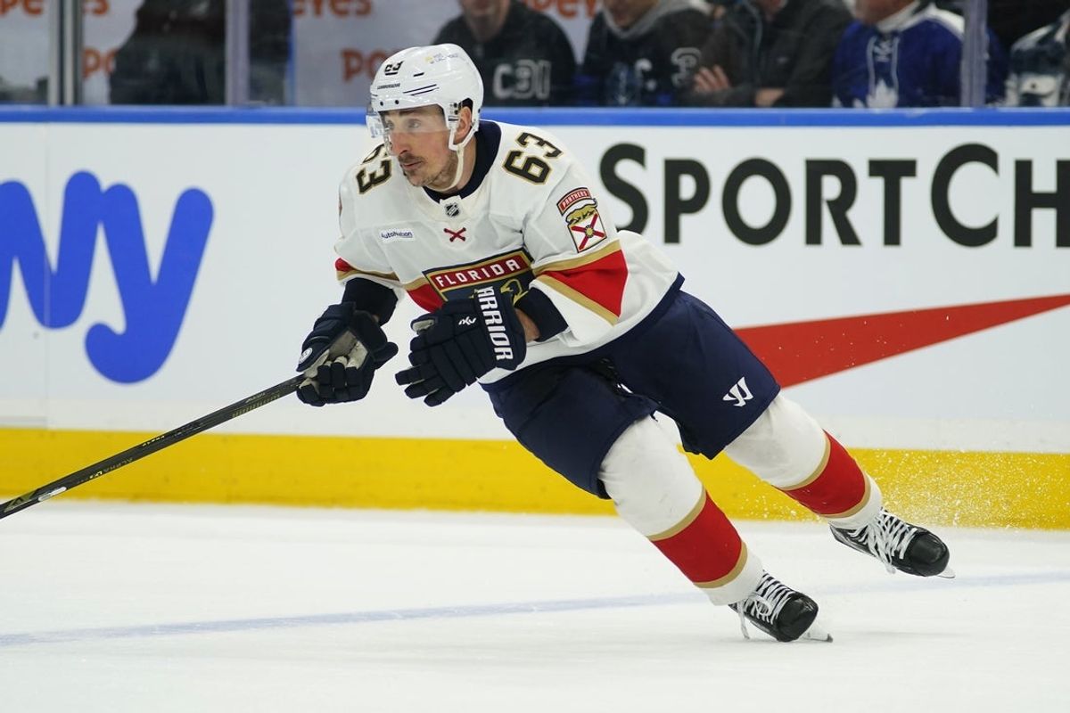 Apr 2, 2025; Toronto, Ontario, CAN; Florida Panthers forward Brad Marchand (63) skates against the Toronto Maple Leafs at Scotiabank Arena. Mandatory Credit: John E. Sokolowski-Imagn Images