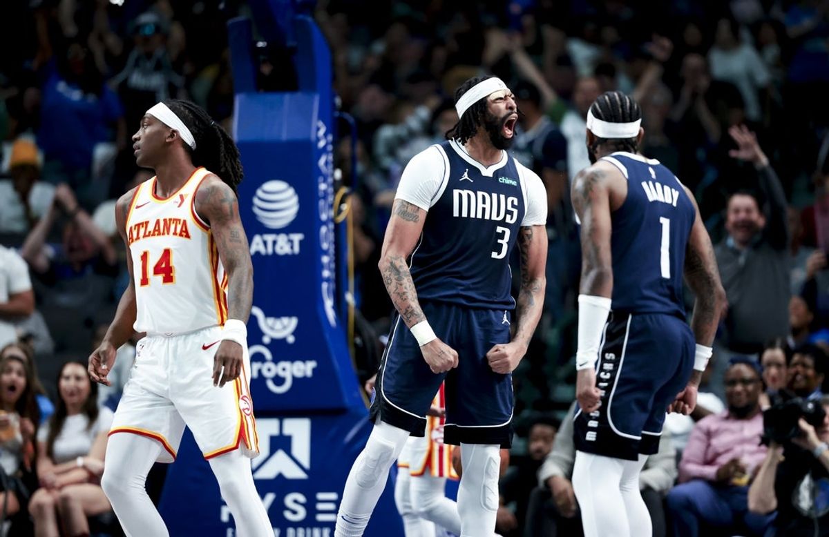 Apr 2, 2025; Dallas, Texas, USA;  Dallas Mavericks forward Anthony Davis (3) reacts in front of Atlanta Hawks guard Terance Mann (14) during the fourth quarter at American Airlines Center. Mandatory Credit: Kevin Jairaj-Imagn Images