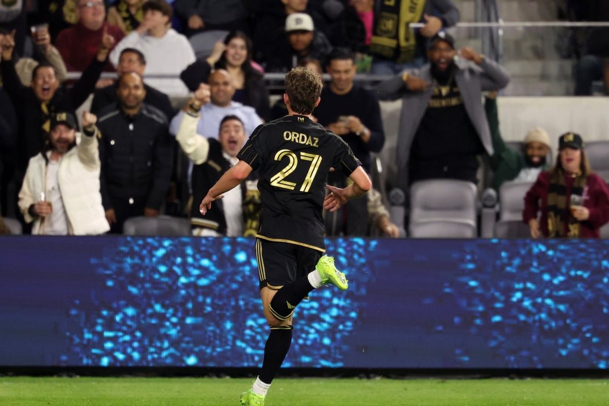 Apr 2, 2025; Los Angeles, California, USA;  LAFC forward Nathan Ordaz (27) reacts after scoring a goal during the second half of a Concacaf Champions Cup Quarterfinal match against Inter Miami CF at BMO Stadium. Mandatory Credit: Kiyoshi Mio-Imagn Images