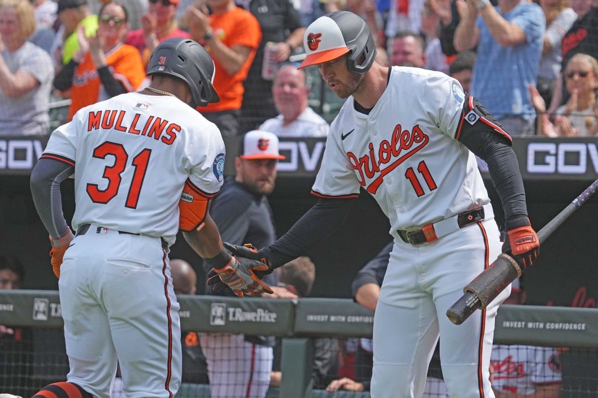 Apr 3, 2025; Baltimore, Maryland, USA; Baltimore Orioles outfielder Cedric Mullins (31) greeted by second baseman Jordan Westburg (11) following his solo home run in the first inning against the Boston Red Sox at Oriole Park at Camden Yards. Mandatory Credit: Mitch Stringer-Imagn Images