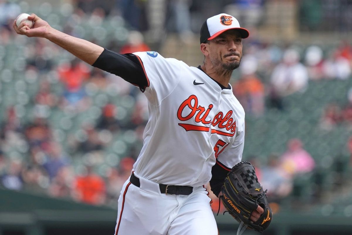 Apr 3, 2025; Baltimore, Maryland, USA; Baltimore Orioles pitcher Charlie Morton (50) delivers during the first inning against the Boston Red Sox at Oriole Park at Camden Yards. Mandatory Credit: Mitch Stringer-Imagn Images