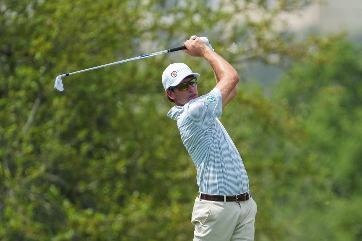 Apr 3, 2025; San Antonio, Texas, USA; Ben Kohles watches his shot on the 18th fairway during the first round of the Valero Texas Open golf tournament. Mandatory Credit: Daniel Dunn-Imagn Images