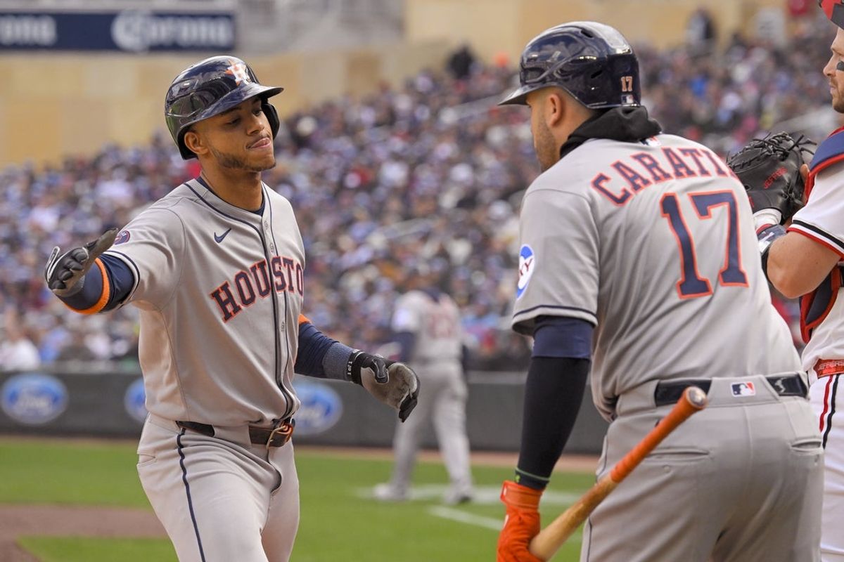 Apr 3, 2025; Minneapolis, Minnesota, USA;  Houston Astros infielder Jeremy Pena (3) celebrates his solo home run against the Minnesota Twins with catcher Victor Caratini (17) during the second inning at Target Field. Mandatory Credit: Nick Wosika-Imagn Images