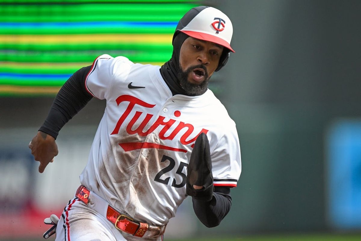 Apr 3, 2025; Minneapolis, Minnesota, USA;  Minnesota Twins outfielder Byron Buxton (25) rounds third on his way to scoring a run against the Houston Astros during first inning at Target Field. Mandatory Credit: Nick Wosika-Imagn Images