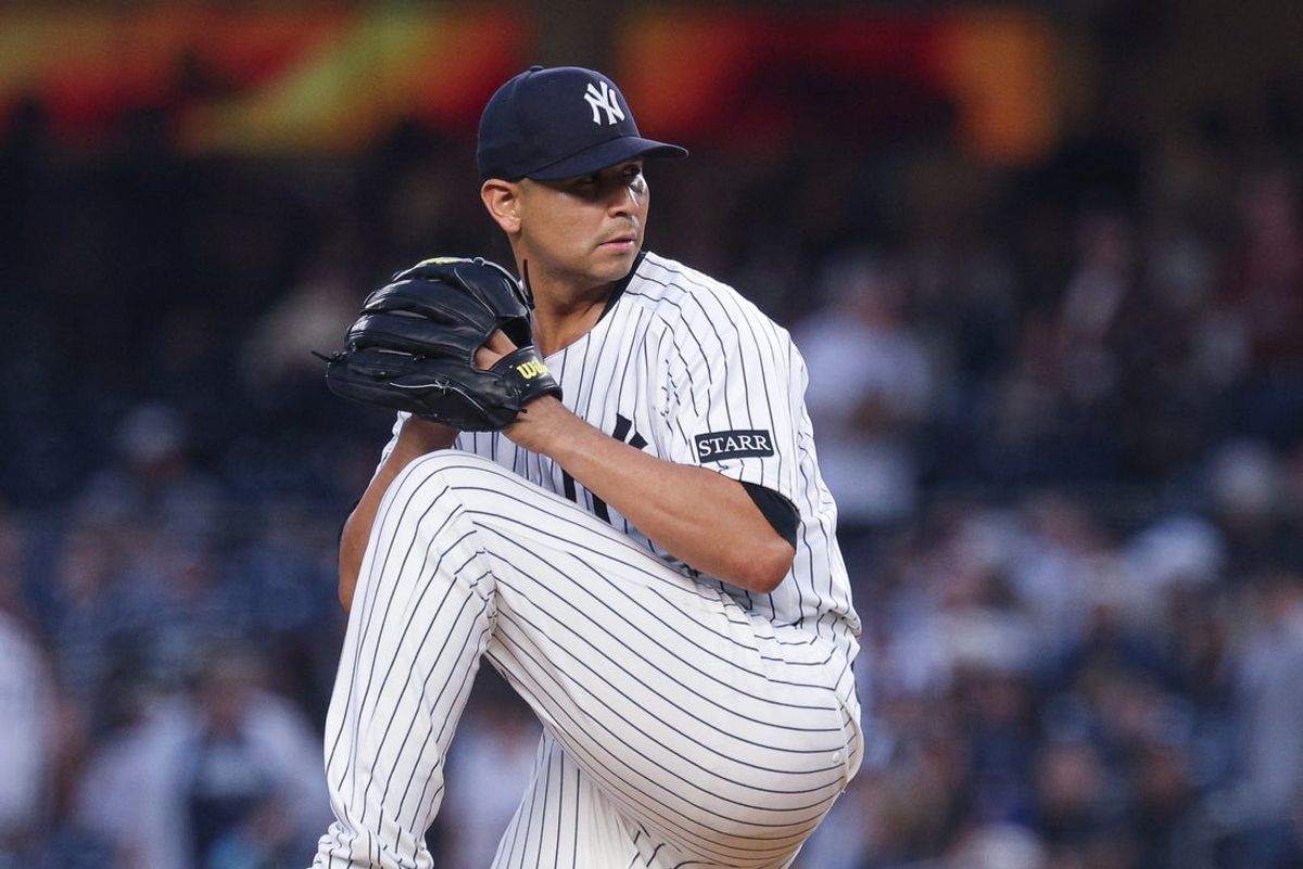 Apr 3, 2025; Bronx, New York, USA; New York Yankees starting pitcher Carlos Carrasco (59) delivers a pitch during the first inning against the Arizona Diamondbacks at Yankee Stadium. Mandatory Credit: Vincent Carchietta-Imagn Images