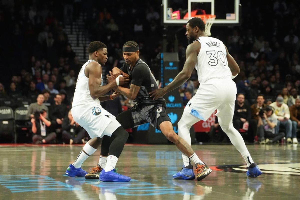 Apr 3, 2025; Brooklyn, New York, USA; Minnesota Timberwolves shooting guard Anthony Edwards (5) and Brooklyn Nets guard Keon Johnson (45) battle for the ball during the first half at Barclays Center. Mandatory Credit: Gregory Fisher-Imagn Images