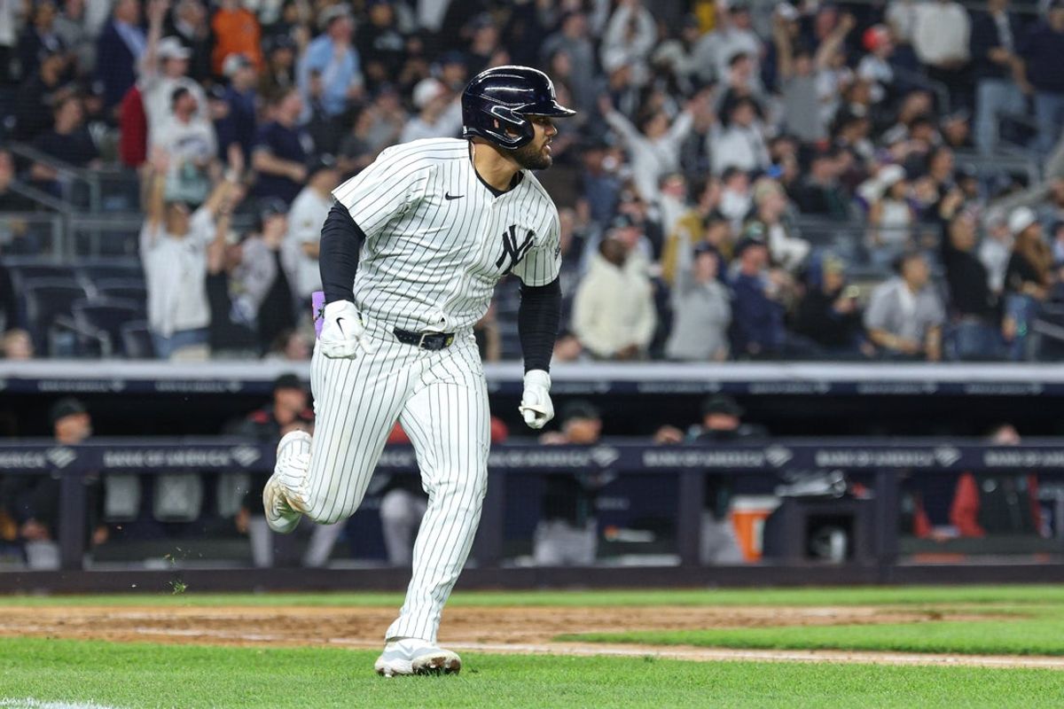Apr 3, 2025; Bronx, New York, USA; New York Yankees left fielder Jasson Dominguez (24) runs the bases after hitting a double during the fourth inning against the Arizona Diamondbacks at Yankee Stadium. Mandatory Credit: Vincent Carchietta-Imagn Images