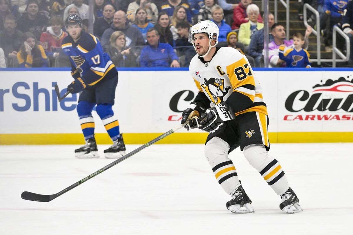 Apr 3, 2025; St. Louis, Missouri, USA;  Pittsburgh Penguins center Sidney Crosby (87) skates against the St. Louis Blues during the first period at Enterprise Center. Mandatory Credit: Jeff Curry-Imagn Images