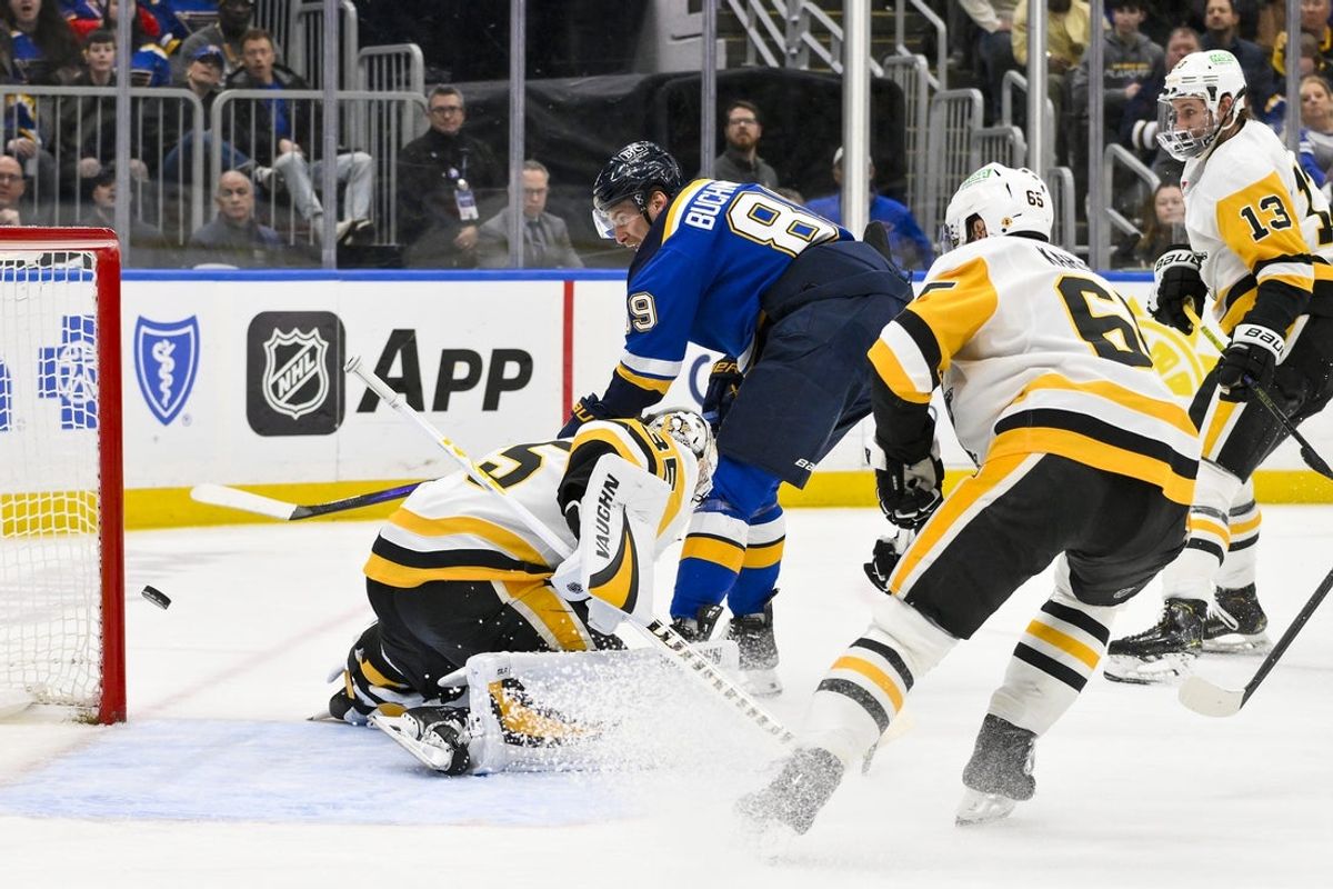 Apr 3, 2025; St. Louis, Missouri, USA;  St. Louis Blues left wing Pavel Buchnevich (89) shoots and scores against Pittsburgh Penguins goaltender Tristan Jarry (35) during the second period at Enterprise Center. Mandatory Credit: Jeff Curry-Imagn Images