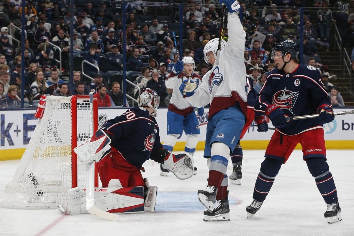 Apr 3, 2025; Columbus, Ohio, USA; Colorado Avalanche defenseman Devon Toews (7) (not pictured) shot beats Columbus Blue Jackets goalie Elvis Merzlikins (90) for a goal during the third period at Nationwide Arena. Mandatory Credit: Russell LaBounty-Imagn Images