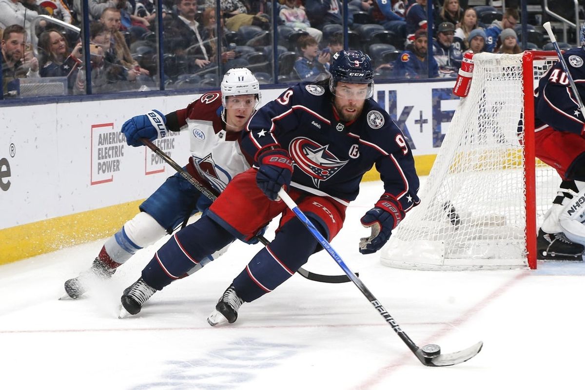 Apr 3, 2025; Columbus, Ohio, USA; Columbus Blue Jackets defenseman Ivan Provorov (9) carries the puck as Colorado Avalanche left wing Parker Kelly (17) trails the play during the third period at Nationwide Arena. Mandatory Credit: Russell LaBounty-Imagn Images