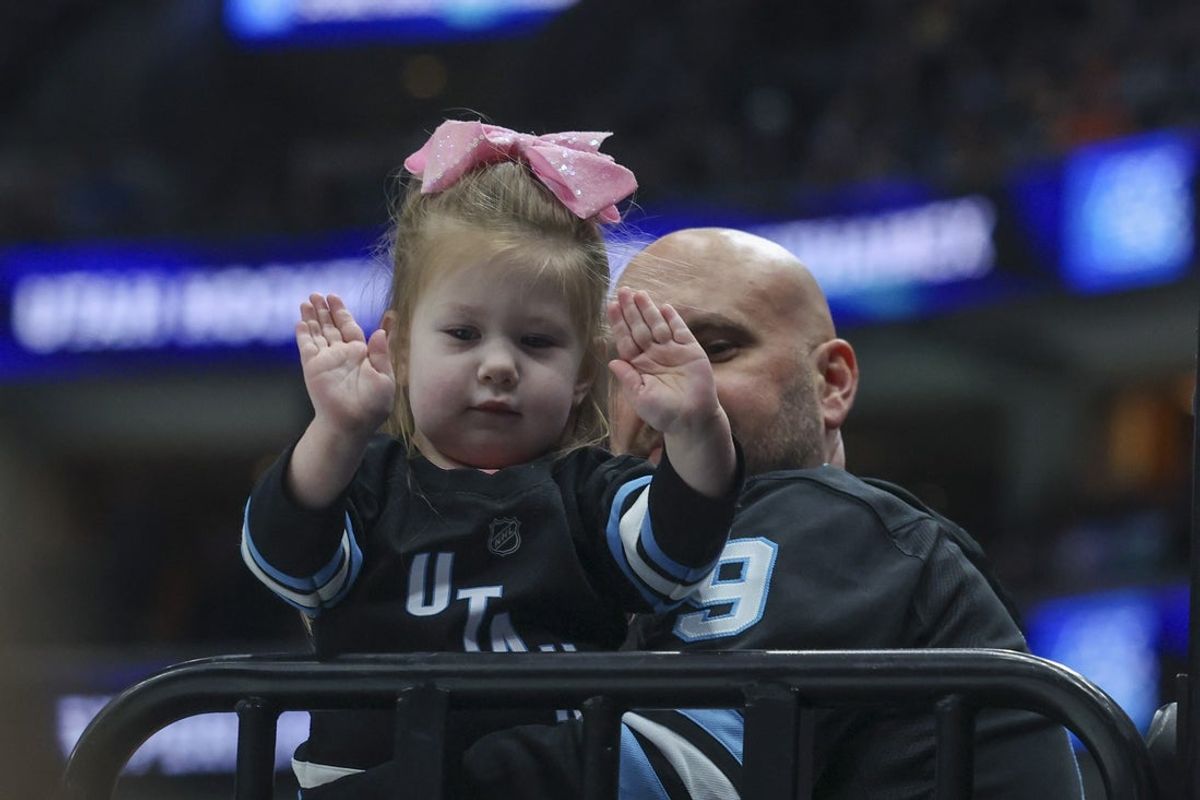 Apr 3, 2025; Salt Lake City, Utah, USA; A Utah Hockey Club fan cheer during the first period of the game against the Los Angeles Kings at Delta Center. Mandatory Credit: Rob Gray-Imagn Images