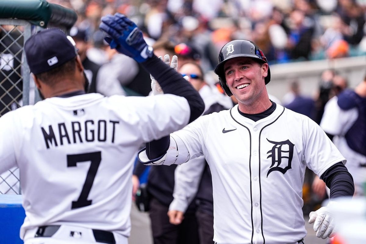 Detroit Tigers left fielder Kerry Carpenter (30) celebrates a home run, his second of the day against Chicago White Sox with outfielder Manuel Margot (7) during the fourth inning of home opening day Comerica Park in Detroit on Friday, April 4, 2025.