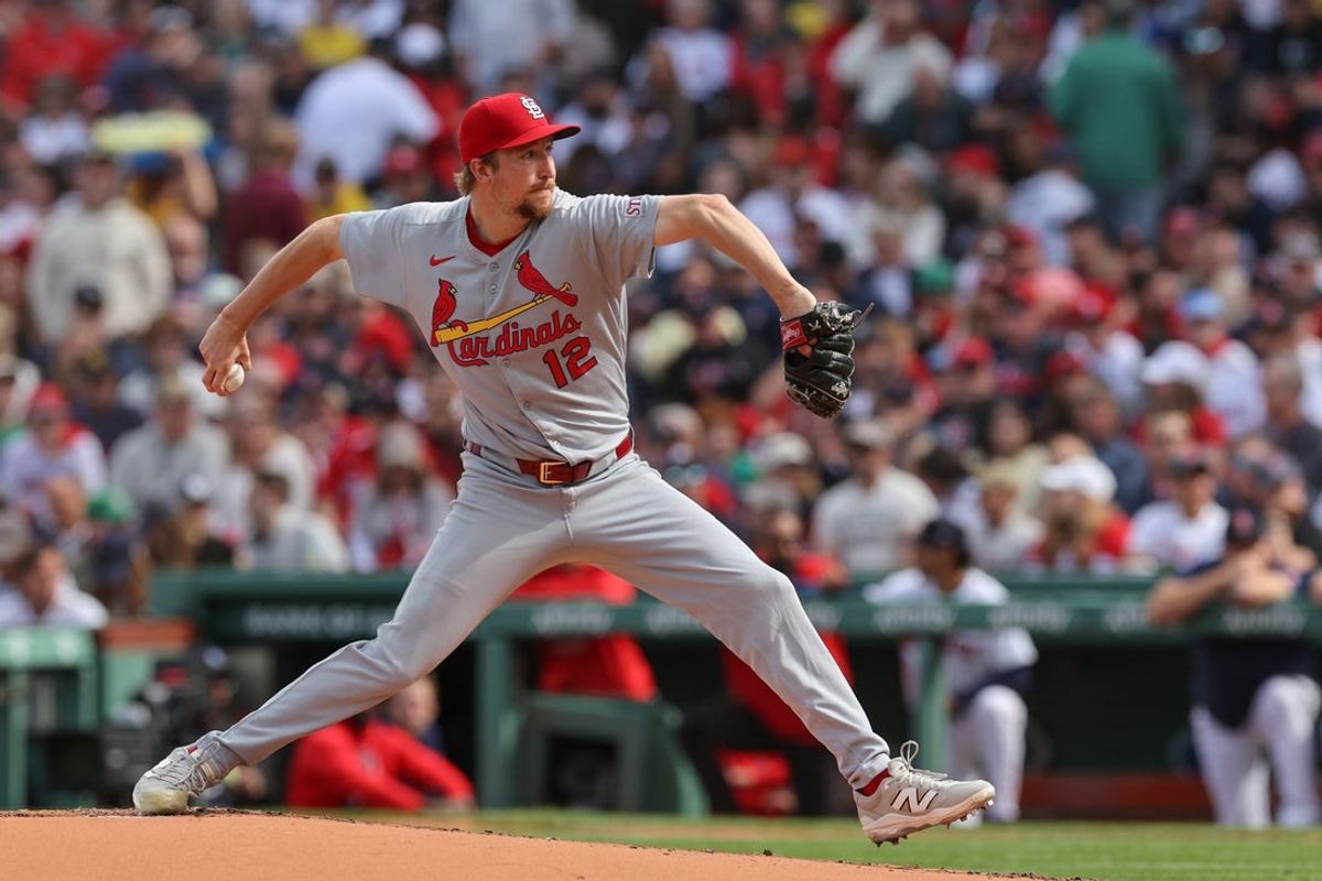 Apr 4, 2025; Boston, Massachusetts, USA; St. Louis Cardinals starting pitcher Erick Fedde (12) delivers a pitch during the second inning against the Boston Red Sox at Fenway Park. Mandatory Credit: Paul Rutherford-Imagn Images