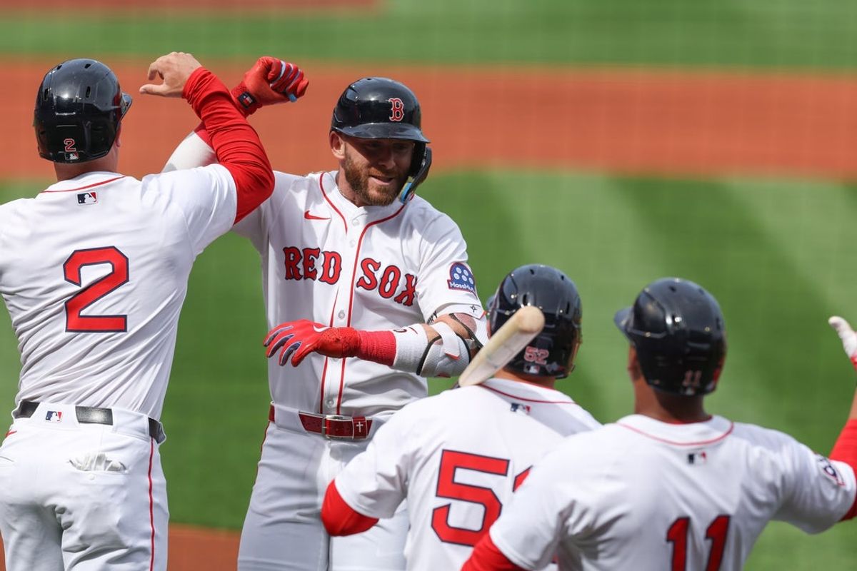 Apr 4, 2025; Boston, Massachusetts, USA; Boston Red Sox shortstop Trevor Story (10) reacts after hitting a three run home run during the first inning against the St. Louis Cardinals at Fenway Park. Mandatory Credit: Paul Rutherford-Imagn Images