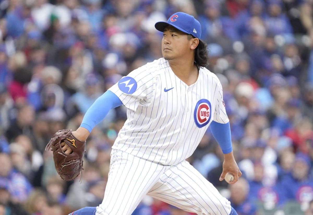 Apr 4, 2025; Chicago, Illinois, USA; Chicago Cubs pitcher Shota Imanaga (18) throws the ball against the San Diego Padres during the first inning at Wrigley Field. Mandatory Credit: David Banks-Imagn Images