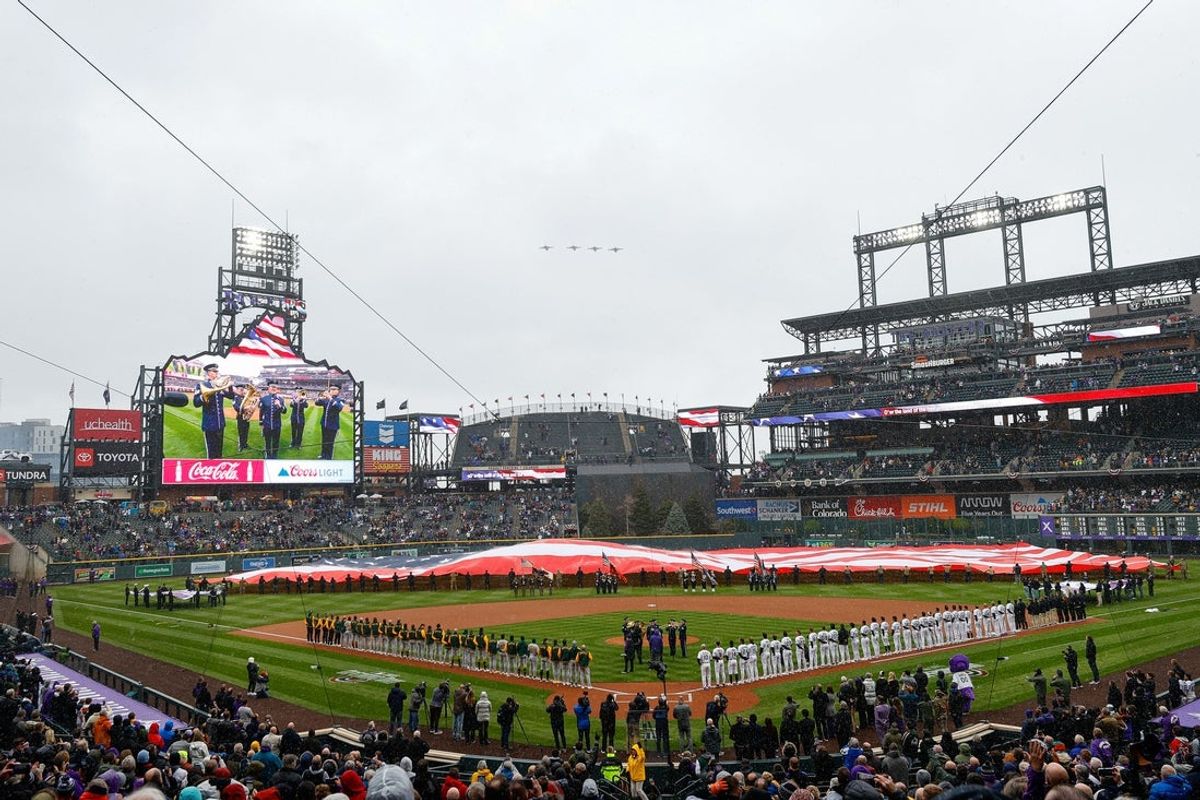 Apr 4, 2025; Denver, Colorado, USA; A general view as jets flyover during the National Anthem before the game between the Colorado Rockies and the Athletics at Coors Field. Mandatory Credit: Isaiah J. Downing-Imagn Images