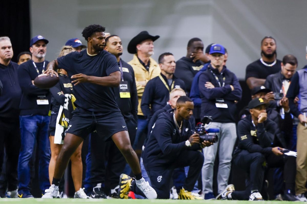 Apr 4, 2025; Boulder, CO, USA; Colorado Buffaloes quarterback Shedeur Sanders (2) passes the ball at the University of Colorado NFL Showcase at the CU Indoor Practice Facility. Mandatory Credit: Michael Ciaglo-Imagn Images