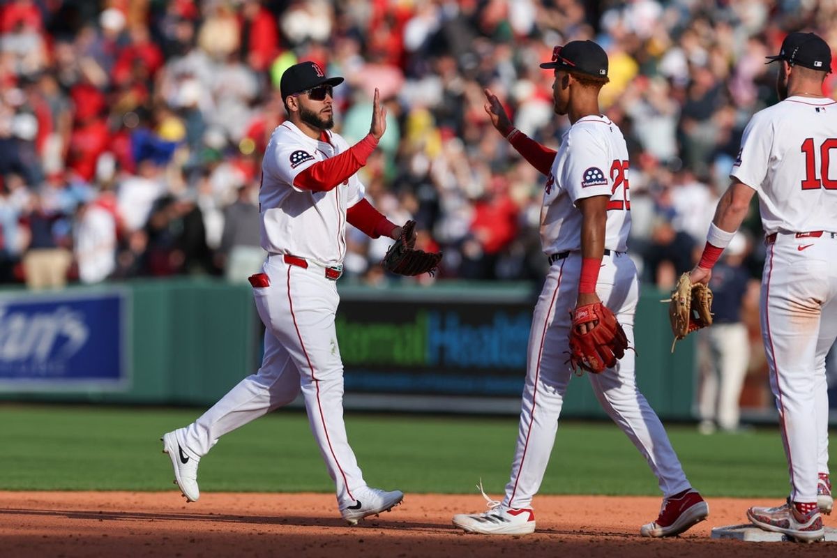 Apr 4, 2025; Boston, Massachusetts, USA; Boston Red Sox right fielder Wilyer Abreu (52) high fives Boston Red Sox second baseman Kristian Campbell (28) after defeating the St. Louis Cardinals at Fenway Park. Mandatory Credit: Paul Rutherford-Imagn Images