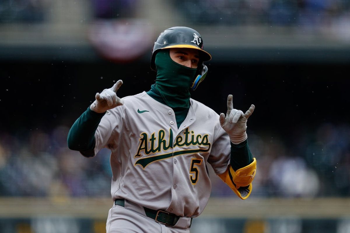 Apr 4, 2025; Denver, Colorado, USA; Athletics shortstop Jacob Wilson (5) rounds the bases on a solo home run in the fourth inning against the Colorado Rockies at Coors Field. Mandatory Credit: Isaiah J. Downing-Imagn Images