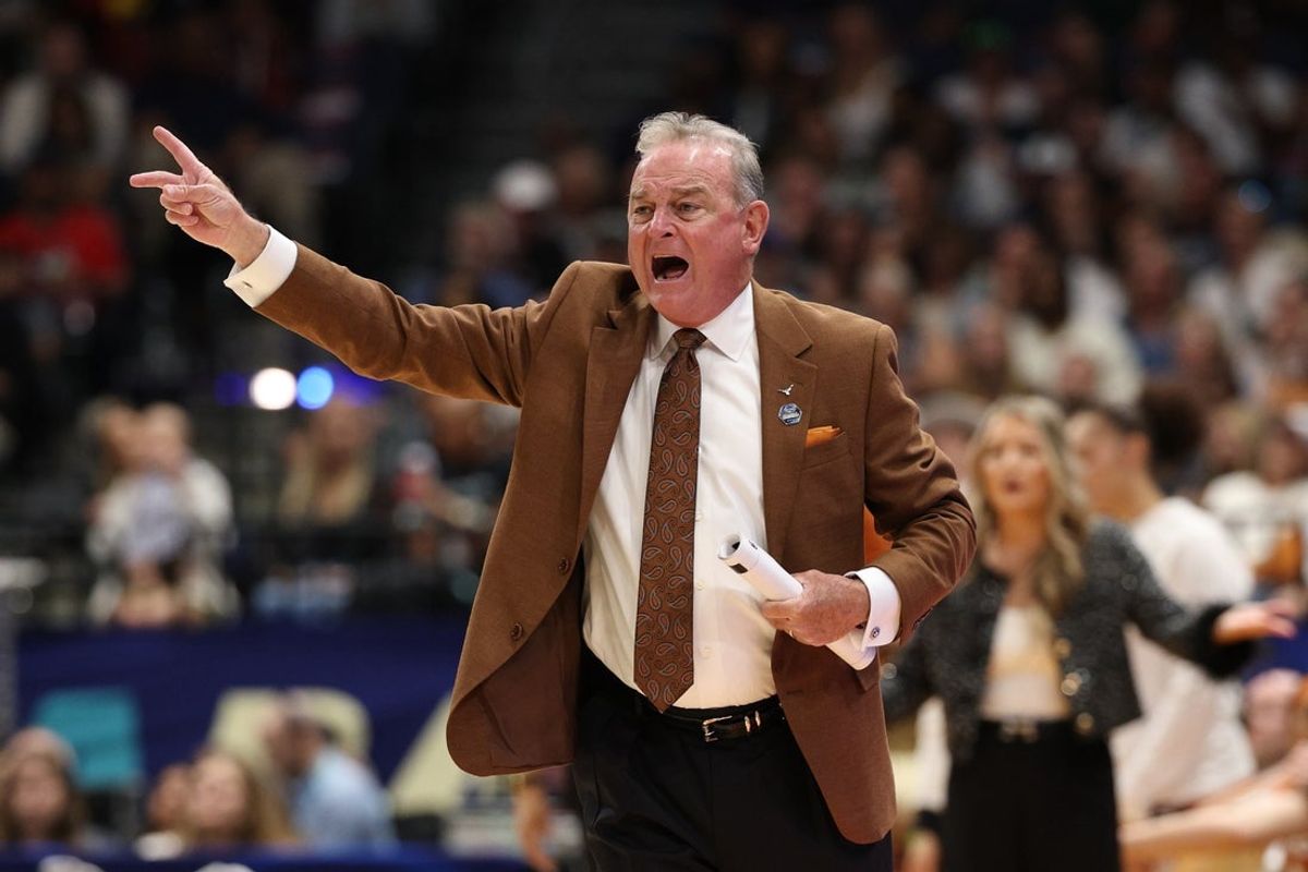 Apr 4, 2025; Tampa, FL, USA;  Texas Longhorns head coach Vic Schaefer reacts during the first quarter in a semifinal of the women's 2025 NCAA tournament at Amalie Arena. Mandatory Credit: Nathan Ray Seebeck-Imagn Images