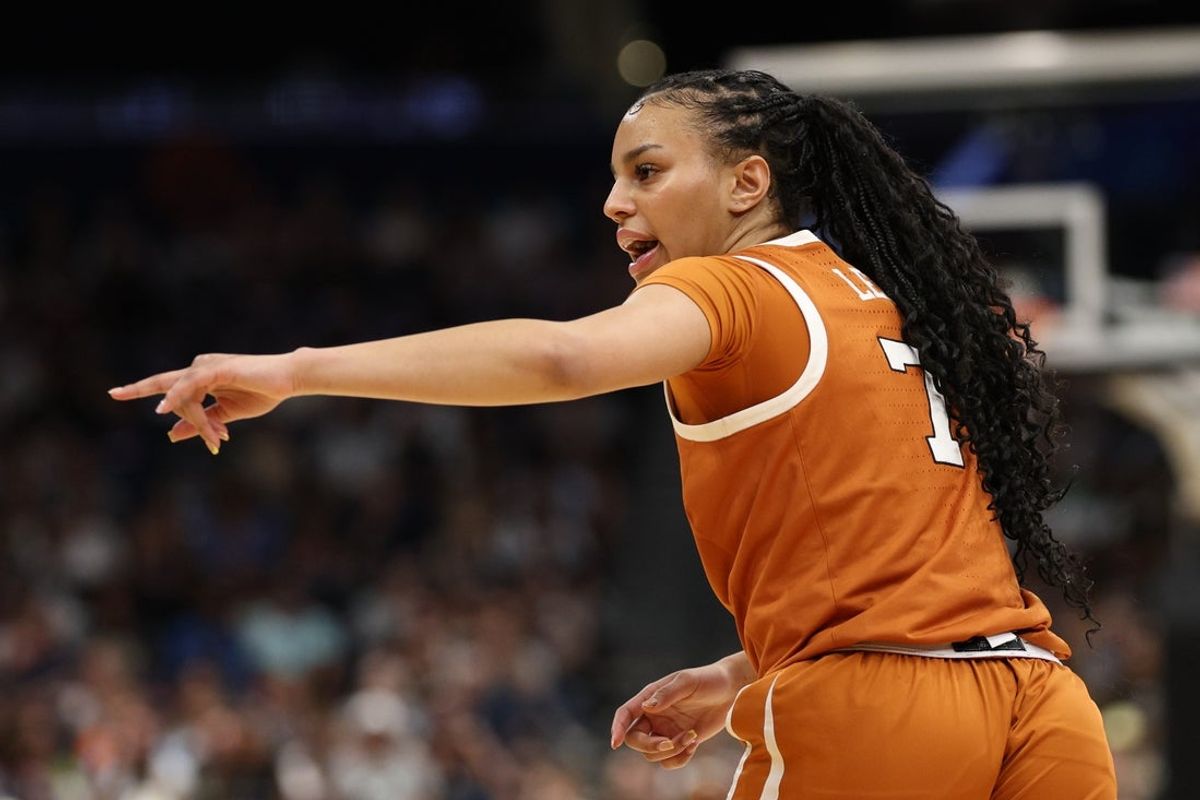 Apr 4, 2025; Tampa, FL, USA;  Texas Longhorns guard Jordan Lee (7) reacts during the second quarter in a semifinal of the women's 2025 NCAA tournament against the South Carolina Gamecocks at Amalie Arena. Mandatory Credit: Nathan Ray Seebeck-Imagn Images