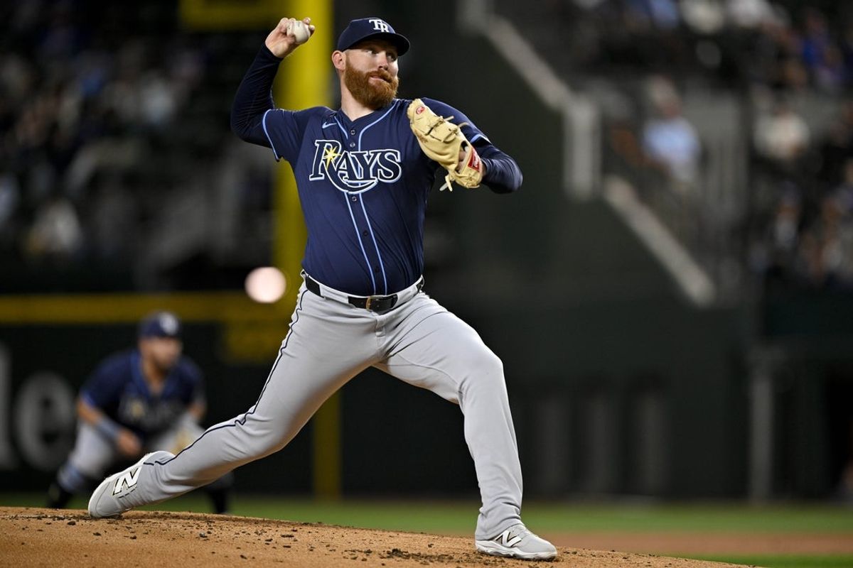 Apr 4, 2025; Arlington, Texas, USA; Tampa Bay Rays starting pitcher Zack Littell (52) pitches against the Texas Rangers during the first inning at Globe Life Field. Mandatory Credit: Jerome Miron-Imagn Images