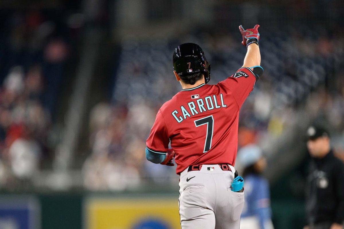 Apr 4, 2025; Washington, District of Columbia, USA; Arizona Diamondbacks outfielder Corbin Carroll (7) reacts after hitting a home run during the fifth inning against the Washington Nationals at Nationals Park. Mandatory Credit: Reggie Hildred-Imagn Images